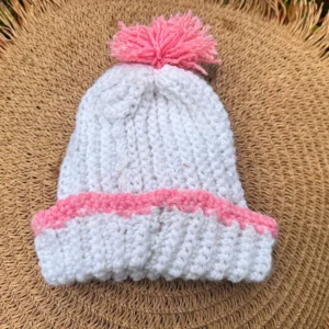 HOME White crochet baby beanie with pink trim and pink pom-pom